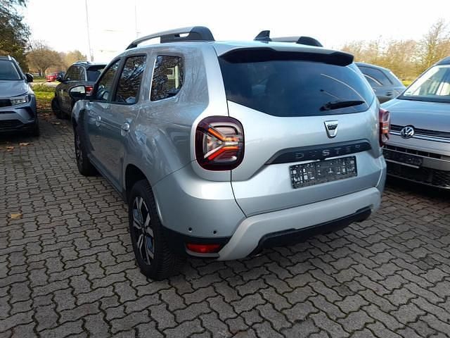 Highland grau metallic highland grau metallic Gebraucht 2021 Dacia Duster Prestige SUV | 16.160 € (Teuer) - Bild 1/4