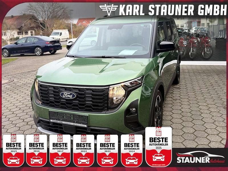 Grün Gebraucht 2024 Ford Tourneo Courier Titanium Van / Kleinbus | 20.980 € (Guter Preis) - Bild 1/2