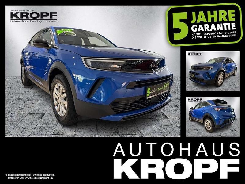 Perl blau/voltaik blau Gebraucht 2023 Opel Mokka Edition SUV | 20.890 € (Fairer Preis) - Bild 1/4