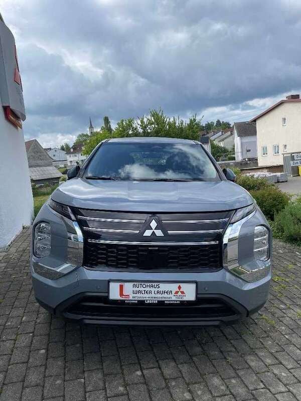 Mondsteingrau Neu 2025 Mitsubishi Outlander P-HEV Basis SUV | 48.490 € (Superpreis) - Bild 1/4