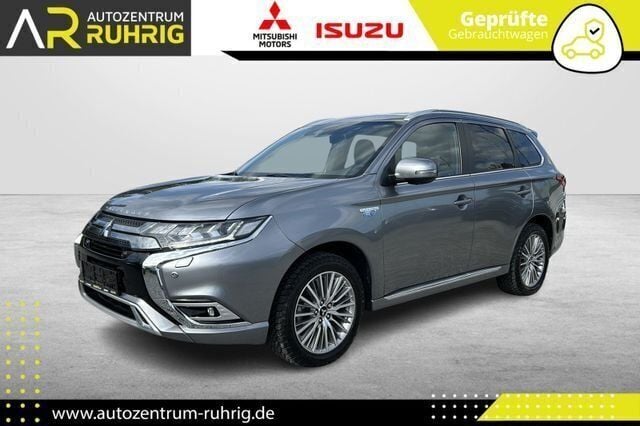 Grau Gebraucht 2021 Mitsubishi Outlander P-HEV Top SUV | 25.990 € (Teuer) - Bild 1/4