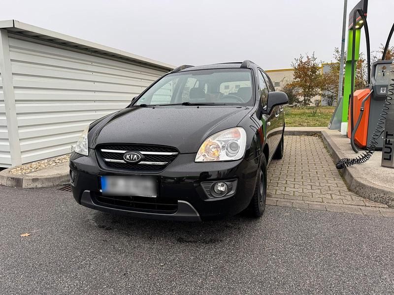 Schwarz Gebraucht 2009 Kia Carens Van / Kleinbus | 1.100 € (Superpreis) - Bild 1/4