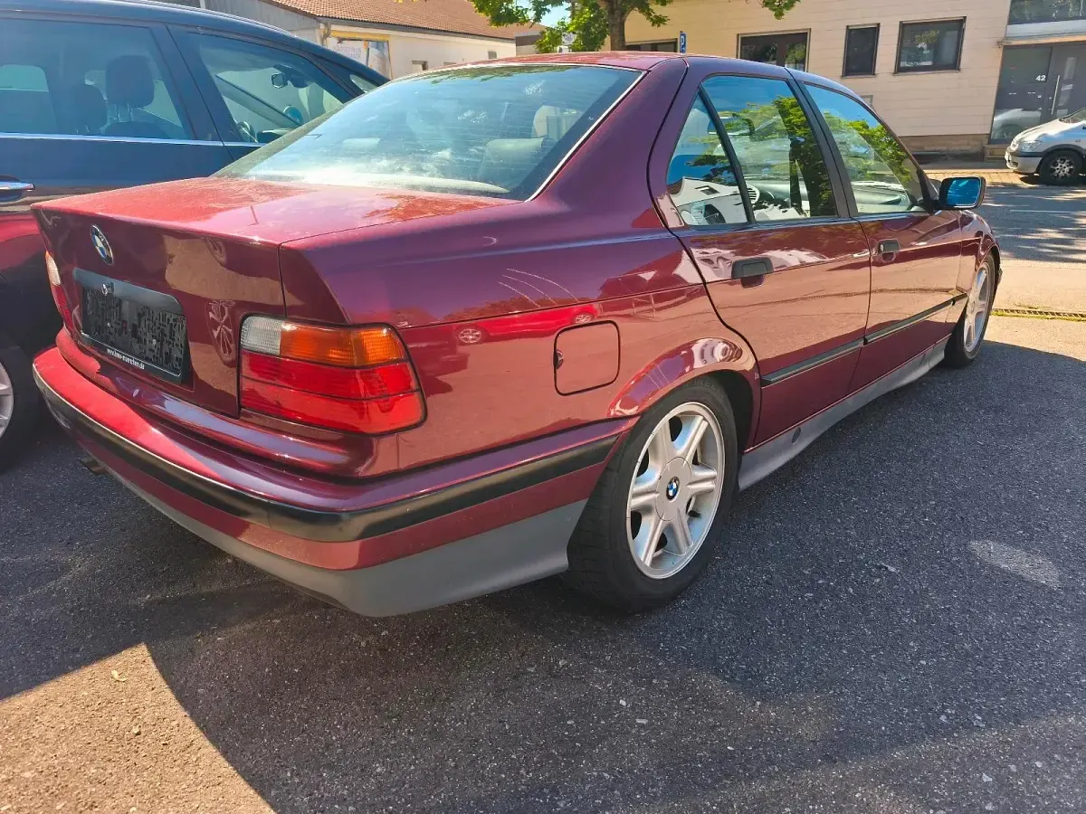 Gebraucht BMW 320 150 PS (110 kW) 1991 Rot Limousine