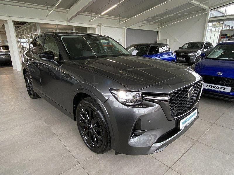 Machine grey (metallic) Gebraucht 2023 Mazda CX-60 Homura-Line SUV | 40.700 € (Guter Preis) - Bild 1/4