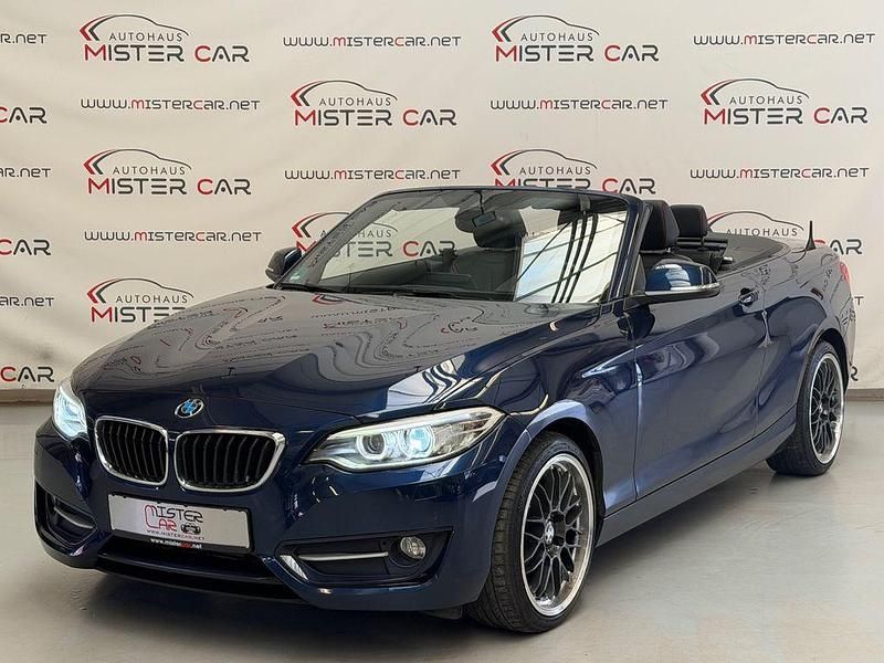 Tiefseeblau metallic Gebraucht 2016 BMW 218 Sport Line Cabrio | 15.890 € (Fairer Preis) - Bild 1/4