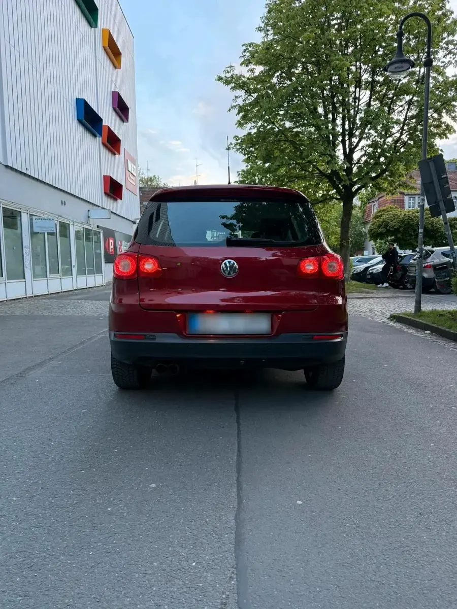Używany VW Tiguan 140 KM (102 kW) 2011 Czerwony SUV