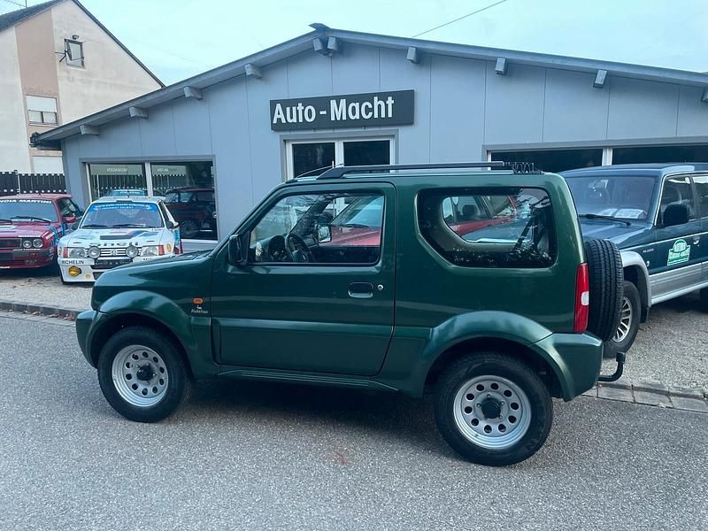 Grün Gebraucht 2010 Suzuki Jimny SUV | 8.900 € (Fairer Preis) - Bild 1/4