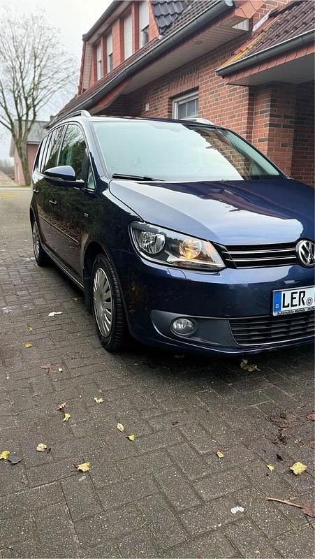 Blau Gebraucht 2013 VW Touran Van / Kleinbus | 8.999 € (Fairer Preis) - Bild 1/4