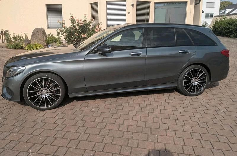 Grau Gebraucht 2017 Mercedes C400 AMG line Kombi | 32.900 € (Fairer Preis) - Bild 1/4