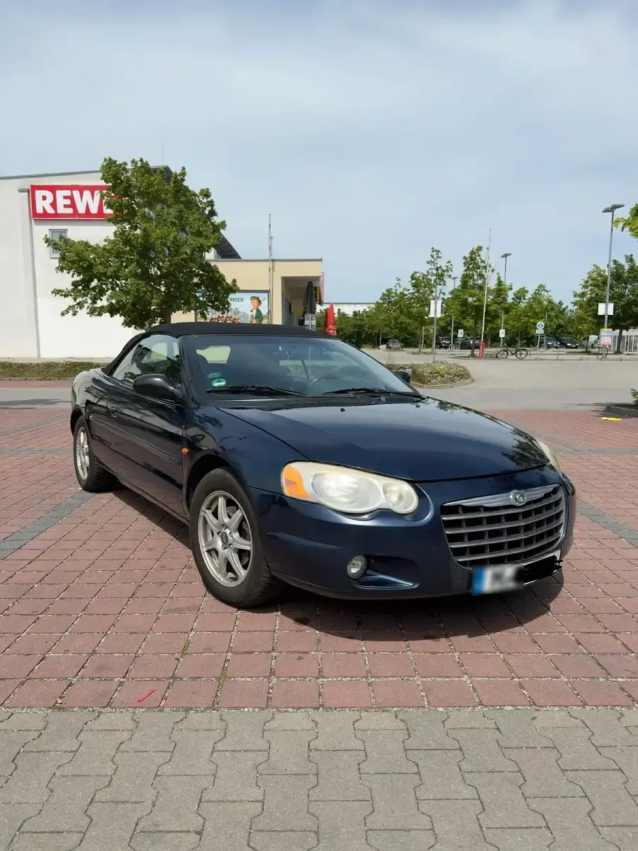 Second-hand Chrysler Sebring Cabriolet Touring 203 CP (149 kW) 2006 Albastru Cabrio