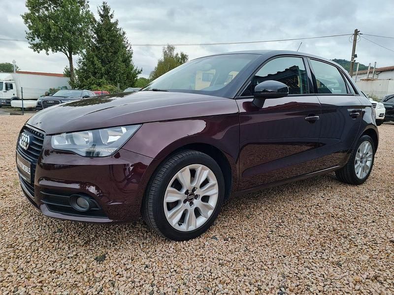Violett (metallic) Gebraucht 2014 Audi A1 Sportback Ambition Kleinwagen | 9.600 € (Fairer Preis) - Bild 1/4