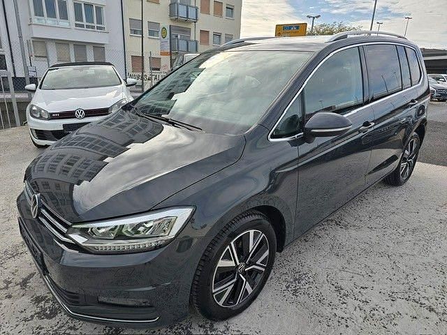 Grau Gebraucht 2022 VW Touran Highline Van / Kleinbus | 29.690 € (Guter Preis) - Bild 1/4