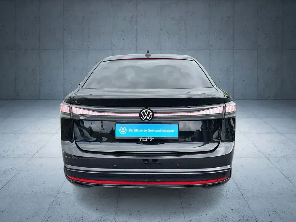 Gebraucht VW ID.7 Pro 210 kW (286 PS) 2023 Grenadillschwarz metallic Kleinwagen