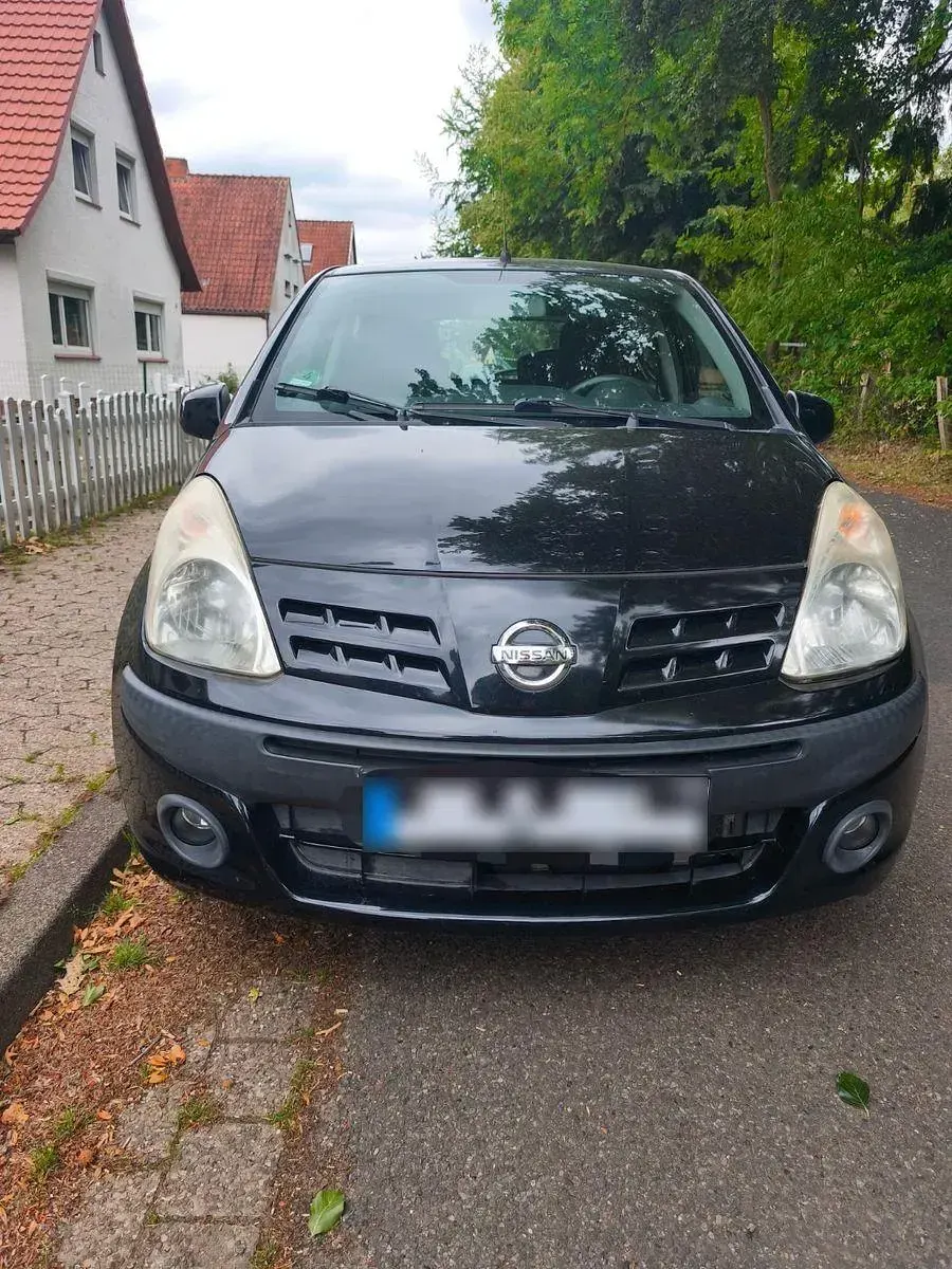Gebraucht Nissan Pixo Acenta 68 PS (50 kW) 2009 Schwarz Kleinwagen