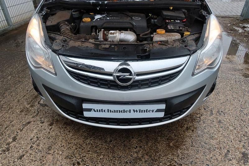 Gebraucht Opel Corsa Active 75 PS (55 kW) 2013 Silber Kleinwagen