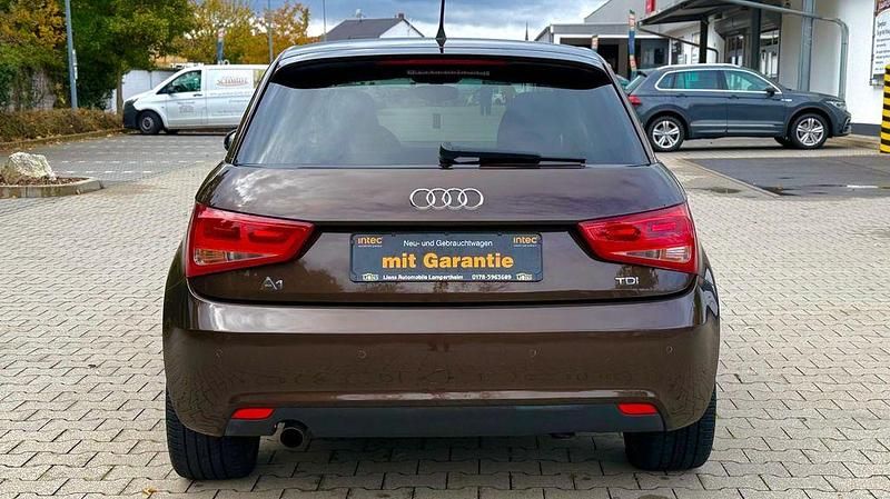 Gebraucht Audi A1 Sportback Attraction 105 PS (77 kW) 2012 Braun Kleinwagen