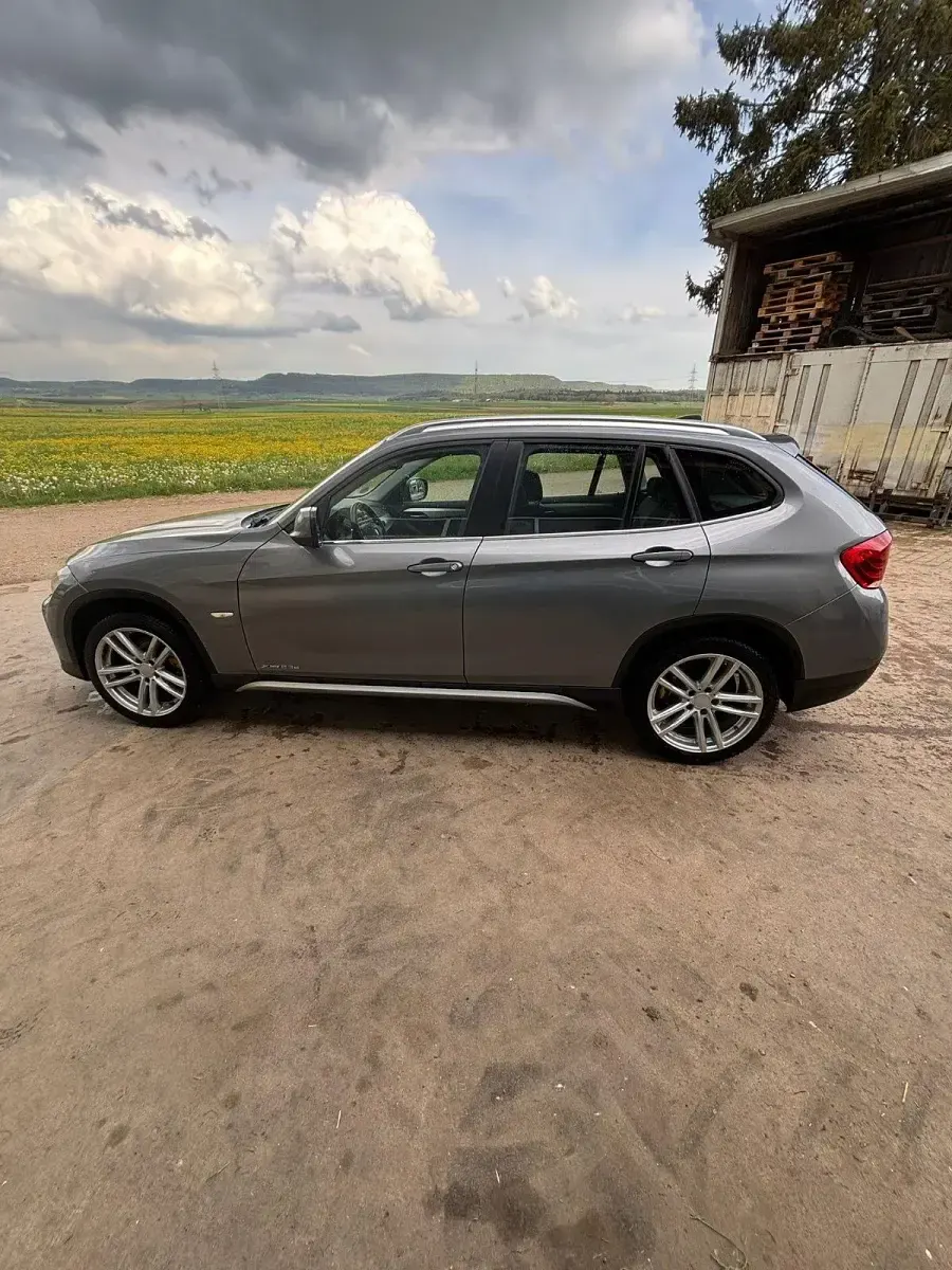 Second-hand BMW X1 204 CP (150 kW) 2012 Argintiu SUV