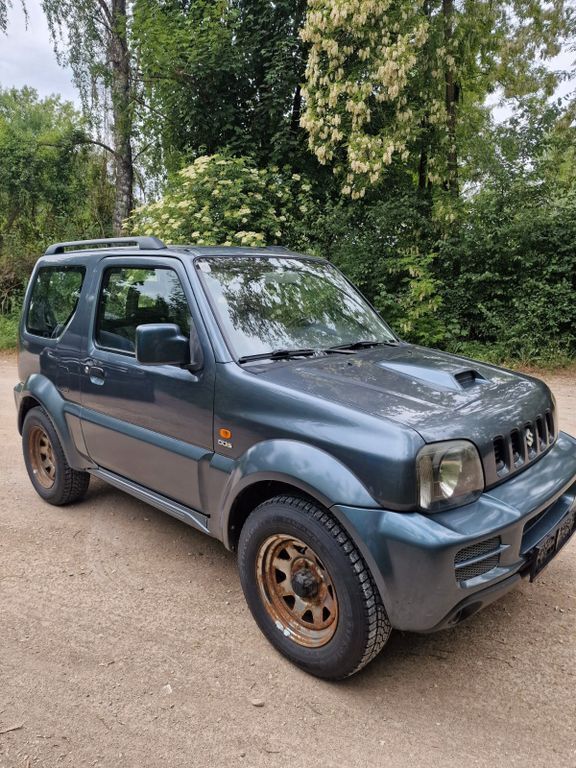 Grau Gebraucht 2006 Suzuki Jimny Club SUV | 3.300 € (Superpreis) - Bild 1/4