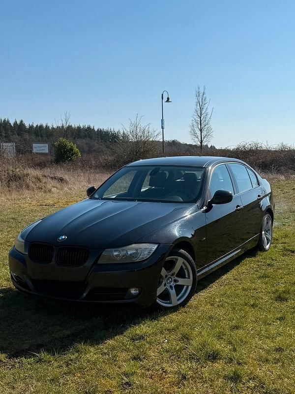 Second-hand BMW 318 143 CP (105 kW) 2009 Negru Berlinǎ