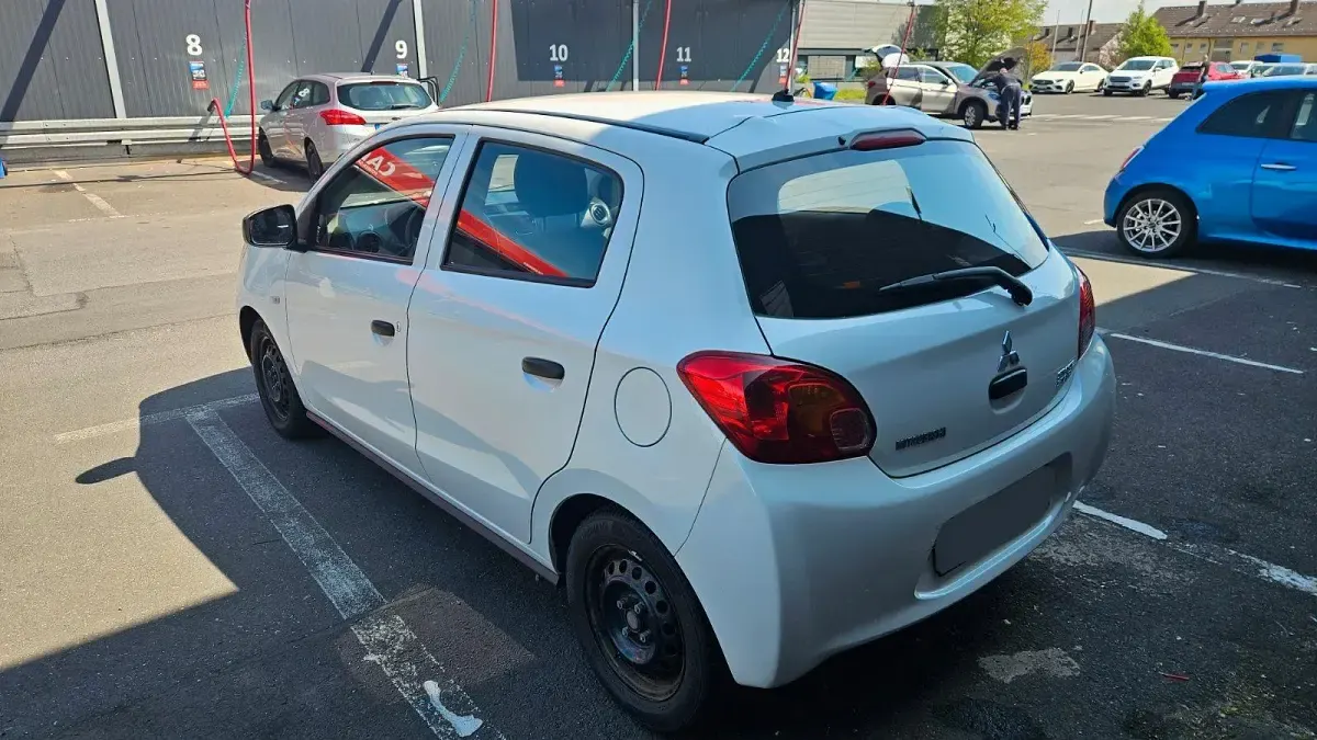 Gebraucht Mitsubishi Space Star 71 PS (52 kW) 2015 Weiß Kleinwagen