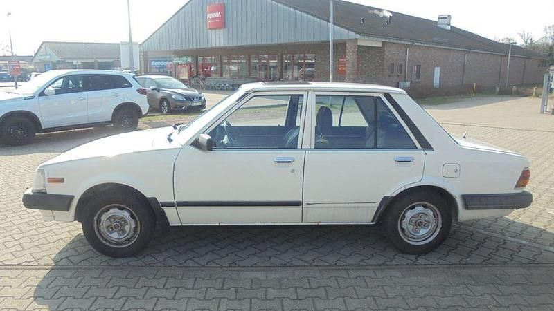 Gebraucht Mazda 323 60 PS (44 kW) 1983 Weiß Limousine
