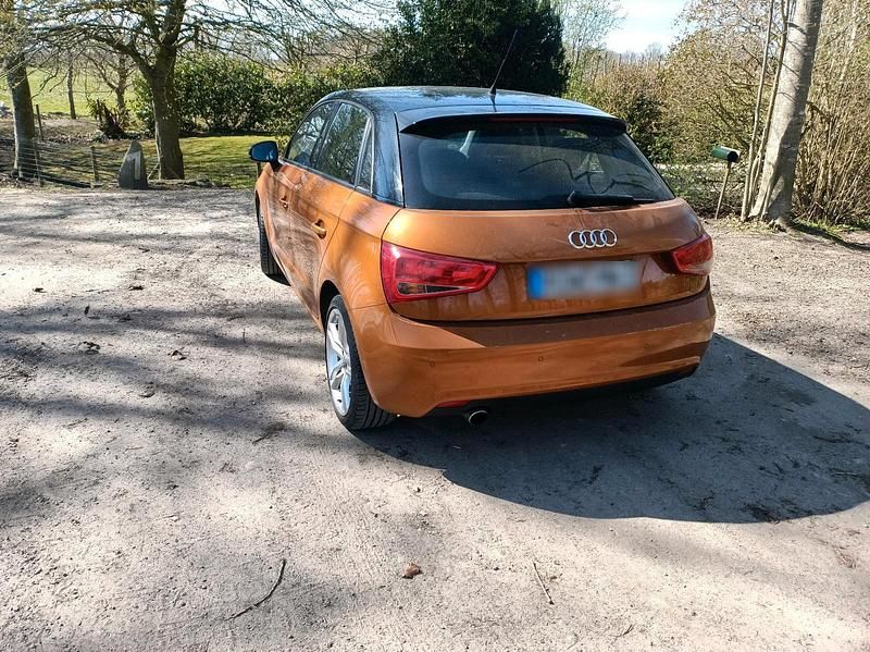 Gebraucht Audi A1 105 PS (77 kW) 2012 Orange Kleinwagen