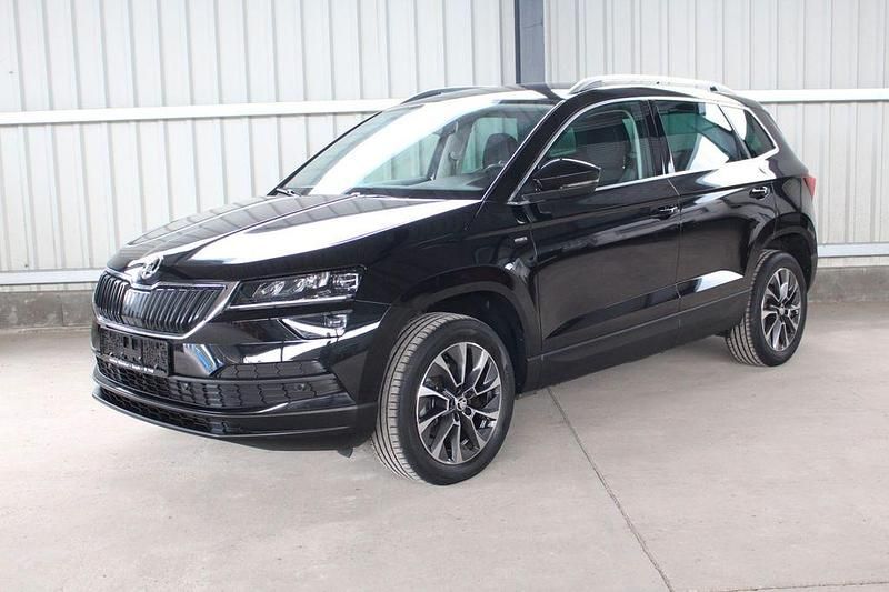 Cerna magic/black magic Gebraucht 2020 Skoda Karoq Drive SUV | 24.980 € (Etwas zu teuer) - Bild 1/4