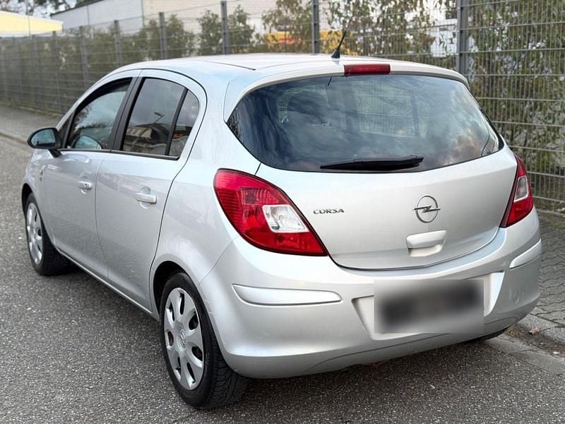 Second-hand Opel Corsa 87 CP (63 kW) 2010 Argintiu Hatchback
