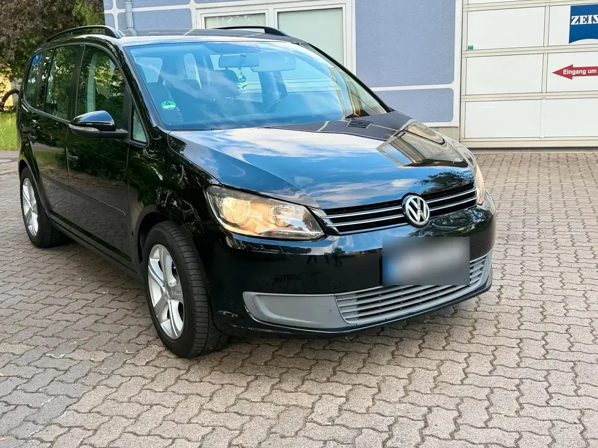 Gebraucht VW Touran 105 PS (77 kW) 2011 Schwarz Van / Kleinbus