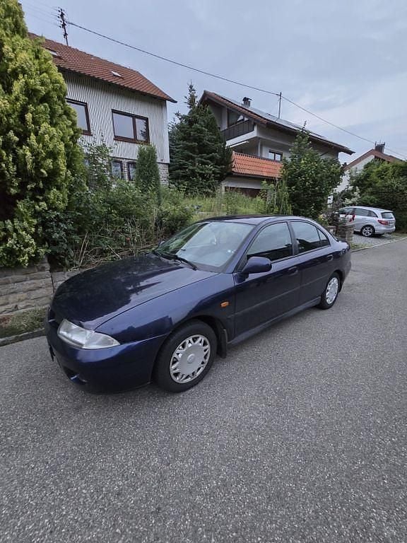 Blau Gebraucht 1998 Mitsubishi Carisma Limousine | 1.650 € (Etwas zu teuer) - Bild 1/4