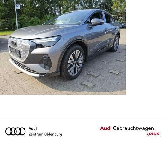 Grau Gebraucht 2023 Audi Q4 Sportback e-tron Advanced SUV | 35.478 € (Fairer Preis) - Bild 1/3