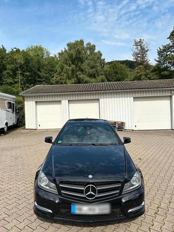 Schwarz Gebraucht 2014 Mercedes C250 AMG Coupé | 14.750 € (Superpreis) - Bild 1/4