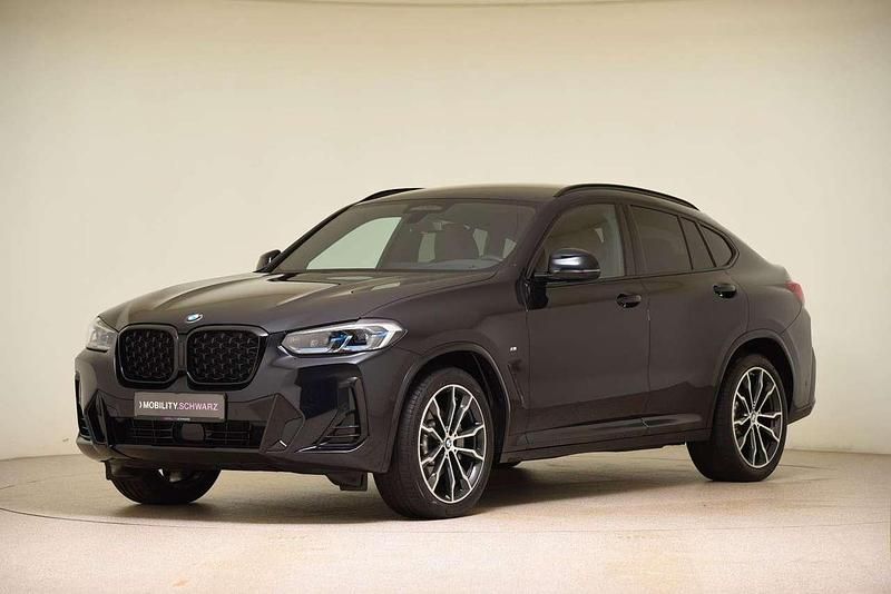 Carbonschwarz metallic Gebraucht 2024 BMW X4 M Sport SUV | 55.460 € (Guter Preis) - Bild 1/4