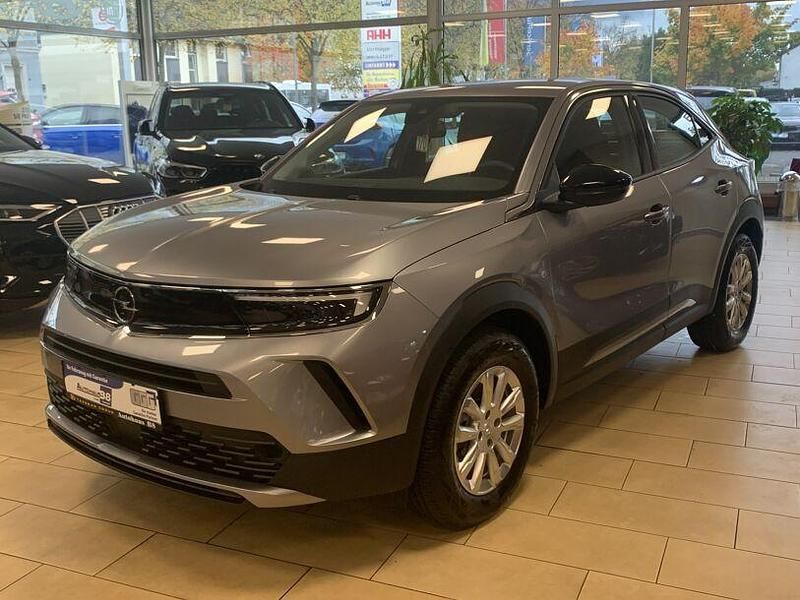 Grau kontrast grau/quarz silber (metallic) Gebraucht 2023 Opel Mokka-e Edition SUV | 18.800 € (Superpreis) - Bild 1/4