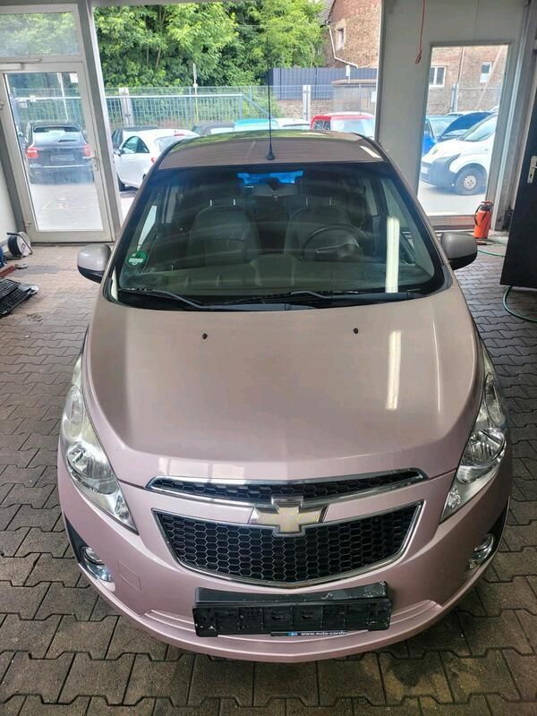 Andere außenfarben Gebraucht 2011 Chevrolet Spark Kleinwagen | 2.499 € - Bild 1/4