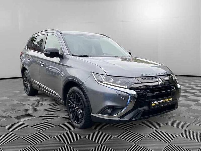 Grau Gebraucht 2021 Mitsubishi Outlander Spirit+ SUV | 30.284 € - Bild 1/4