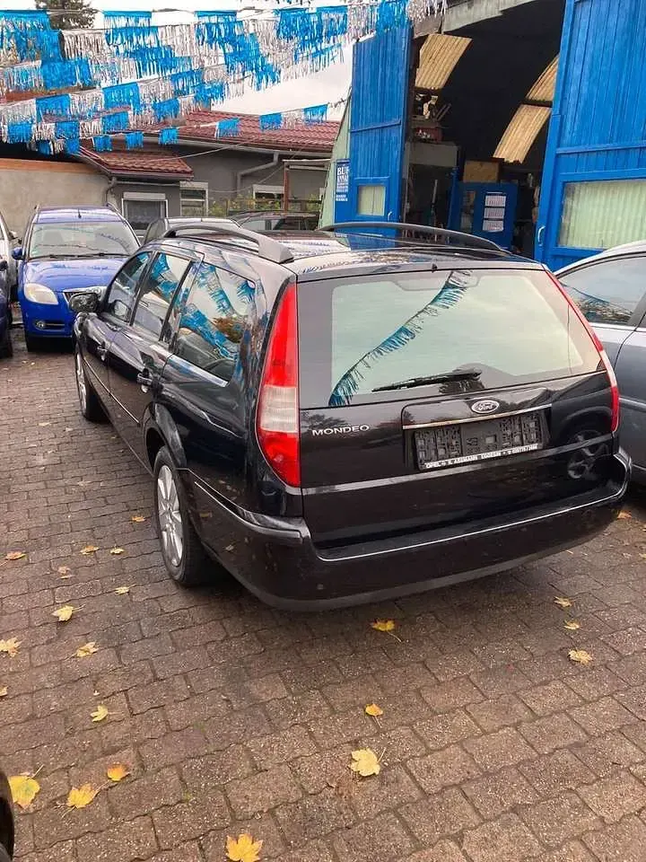 Gebraucht Ford Mondeo Viva 125 PS (91 kW) 2005 Pantherschwarz metallic Kombi