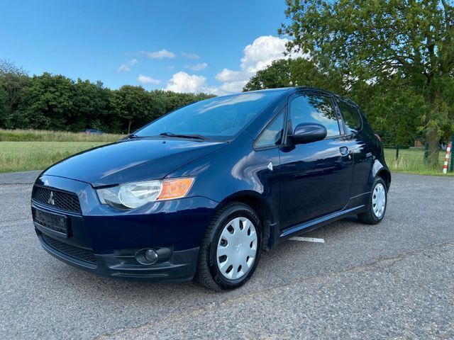 Tansanitblau (p) (metallic) Gebraucht 2013 Mitsubishi Colt Kleinwagen | 4.490 € (Fairer Preis) - Bild 1/4