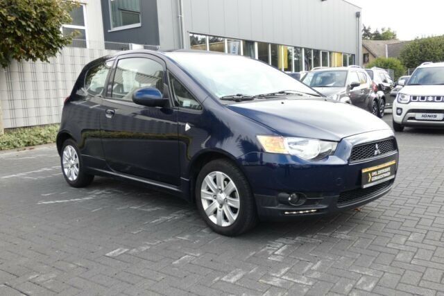 Gebraucht Mitsubishi Colt 95 PS (69 kW) 2013 Blau metallic Kleinwagen