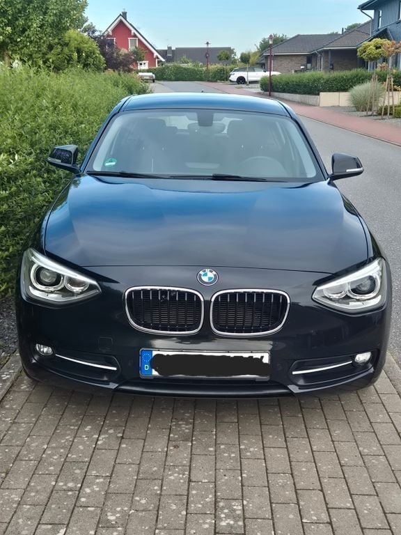 Schwarz Gebraucht 2012 BMW 116 Sport Line Kleinwagen | 9.750 € (Fairer Preis) - Bild 1/4