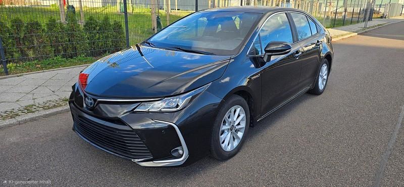 Schwarz Gebraucht 2022 Toyota Corolla Hybrid Limousine | 21.699 € (Fairer Preis) - Bild 1/4