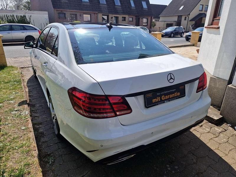Gebraucht Mercedes E300 AMG 249 PS (183 kW) 2014 Polarweiss  unilack Limousine
