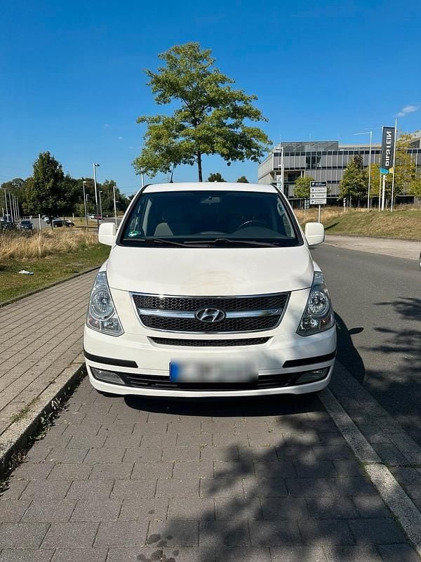 Weiß Gebraucht 2012 Hyundai H-1 Van / Kleinbus | 13.600 € (Fairer Preis) - Bild 1/4
