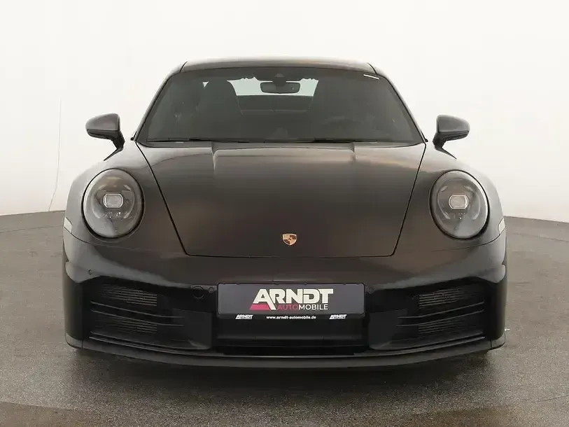 Gebraucht Porsche 911 Carrera T 394 PS (289 kW) 2025 Tiefschwarzmetallic Coupé