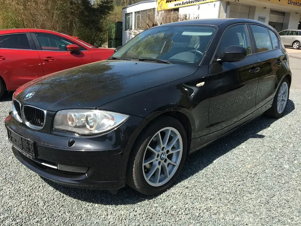 Second-hand BMW 116 122 CP (89 kW) 2009 Negru Hatchback