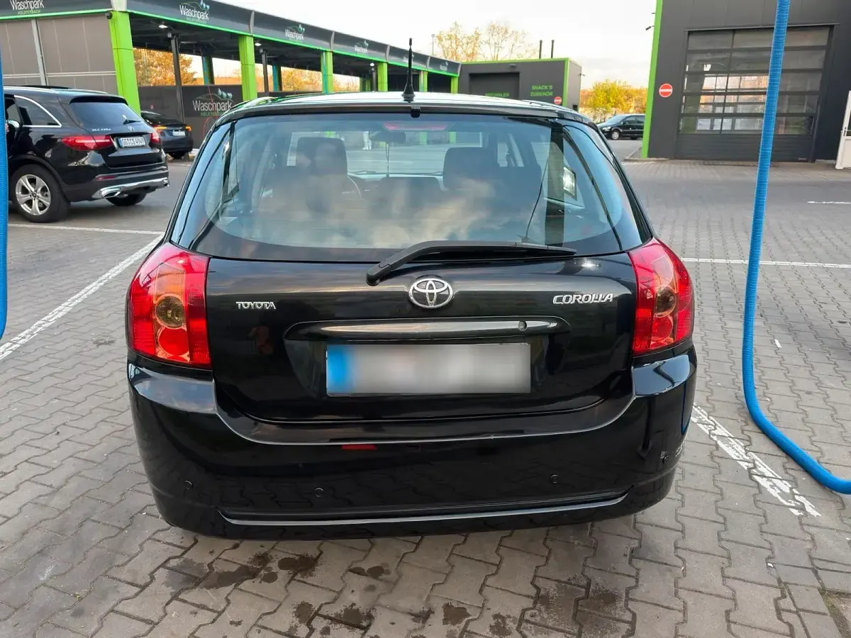 Gebraucht Toyota Corolla 97 PS (71 kW) 2006 Schwarz Kleinwagen
