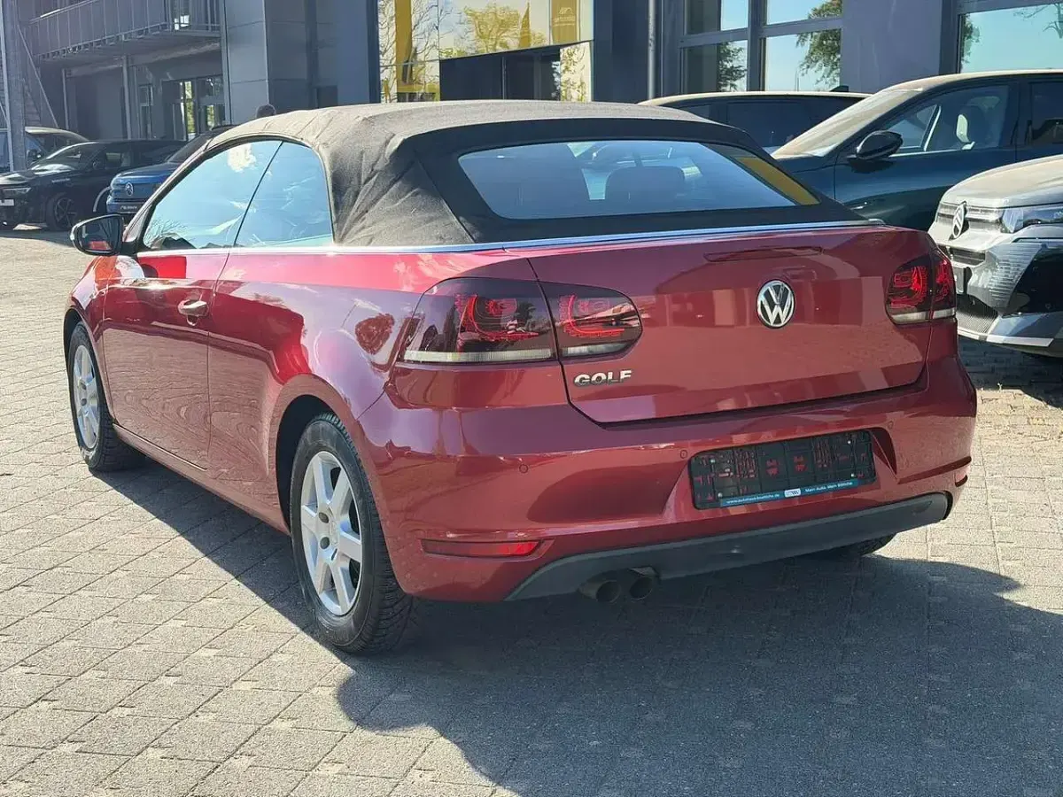 Gebraucht VW Golf Cabriolet 122 PS (89 kW) 2012 Sunset red metallic Cabrio
