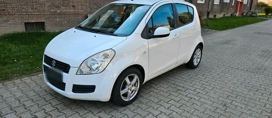 Second-hand Suzuki Splash 77 CP (56 kW) 2011 Alb Hatchback