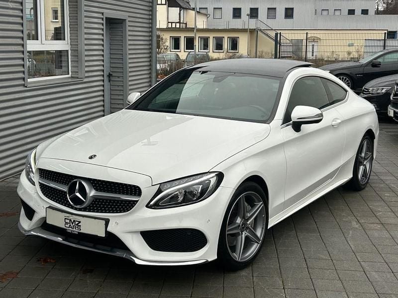 Weiß Gebraucht 2017 Mercedes C200 AMG line Coupé | 25.380 € (Fairer Preis) - Bild 1/4