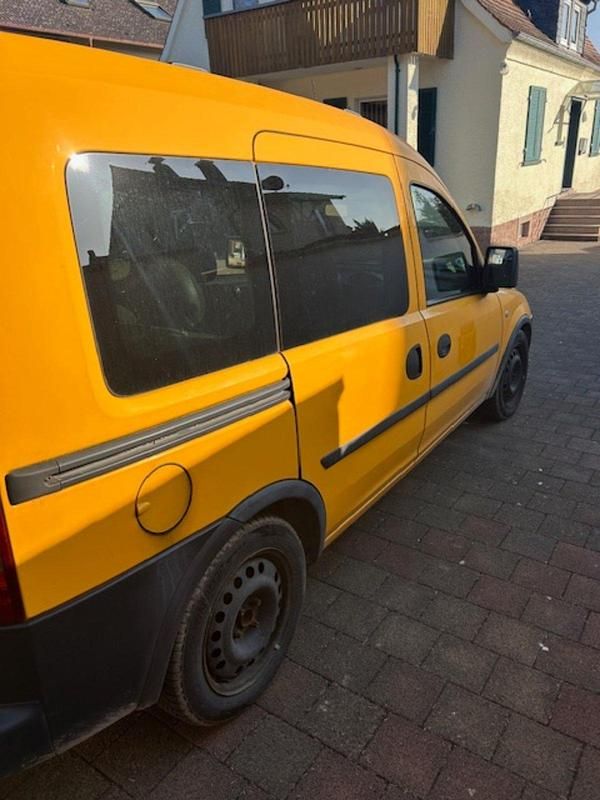 Second-hand Opel Combo 75 CP (55 kW) 2011 Galben Monovolum